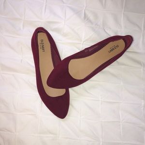 Cranberry suede flats.